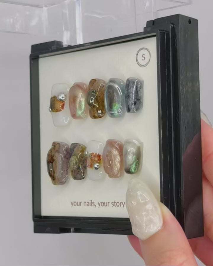 Ethereal Terrain handmade press-on nails — soft neutral tones with an earthy finish, perfect for an elegant, reusable manicure.
